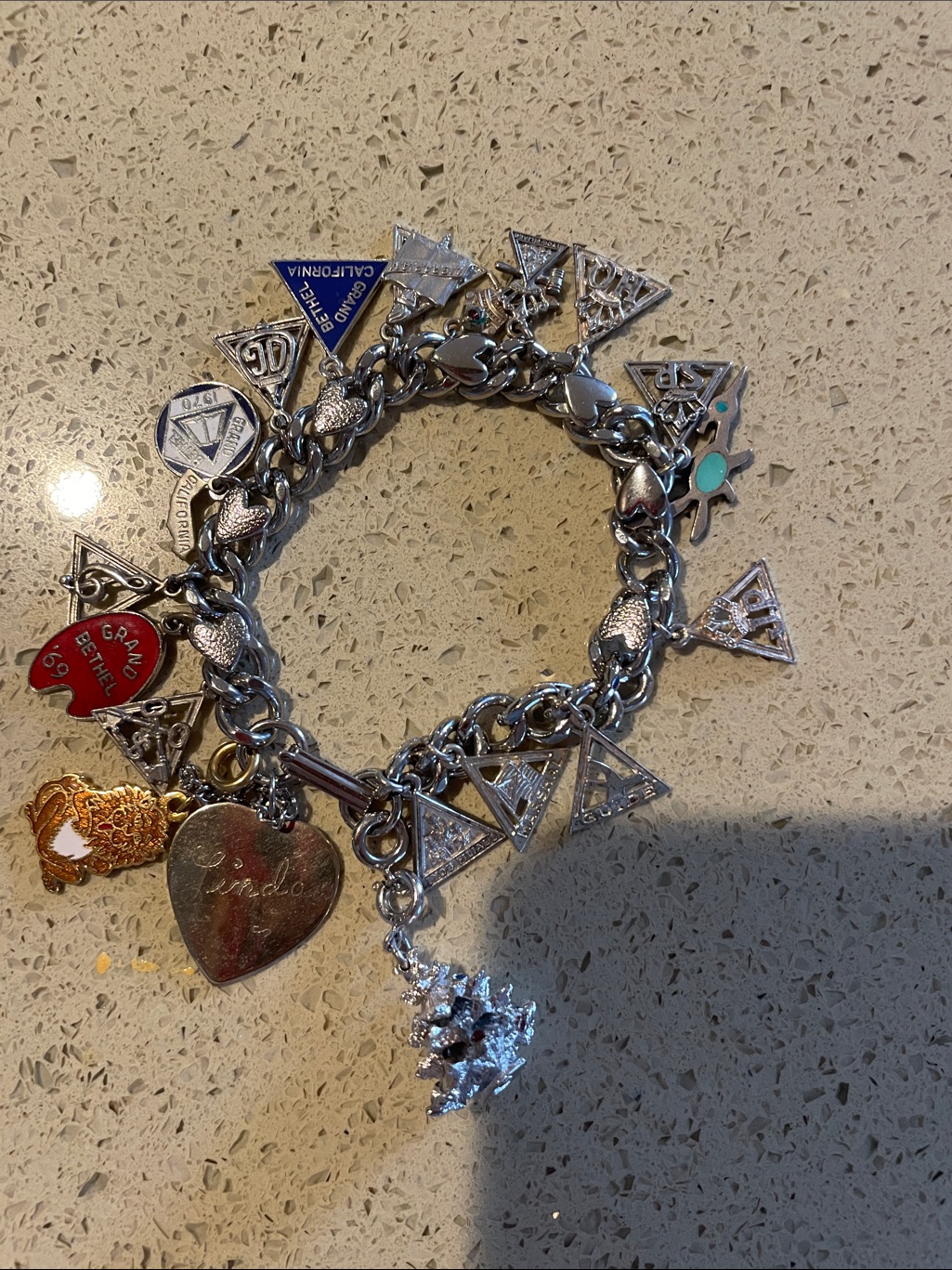 Silver-Tone Multi-Charm Bracelet With Red And Turquoise Accents